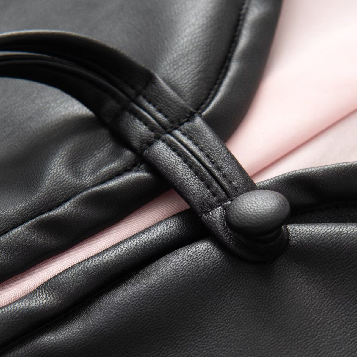 Pan button long sleeved round neck leather jacket