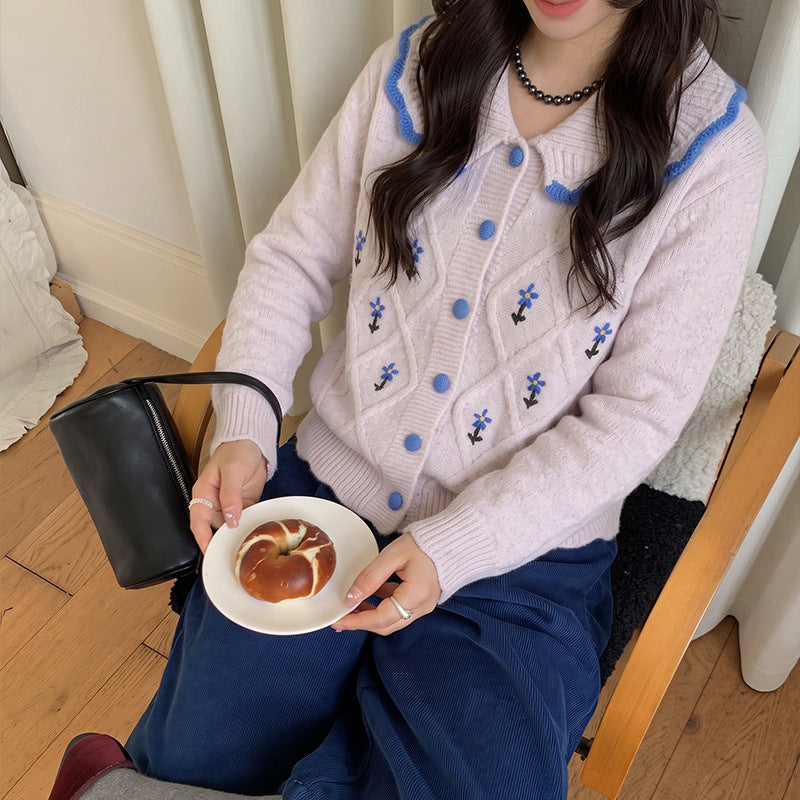 Contrasting diamond patterned sweater